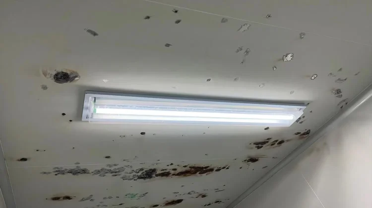Chemically damaged cleanroom panel.jpg