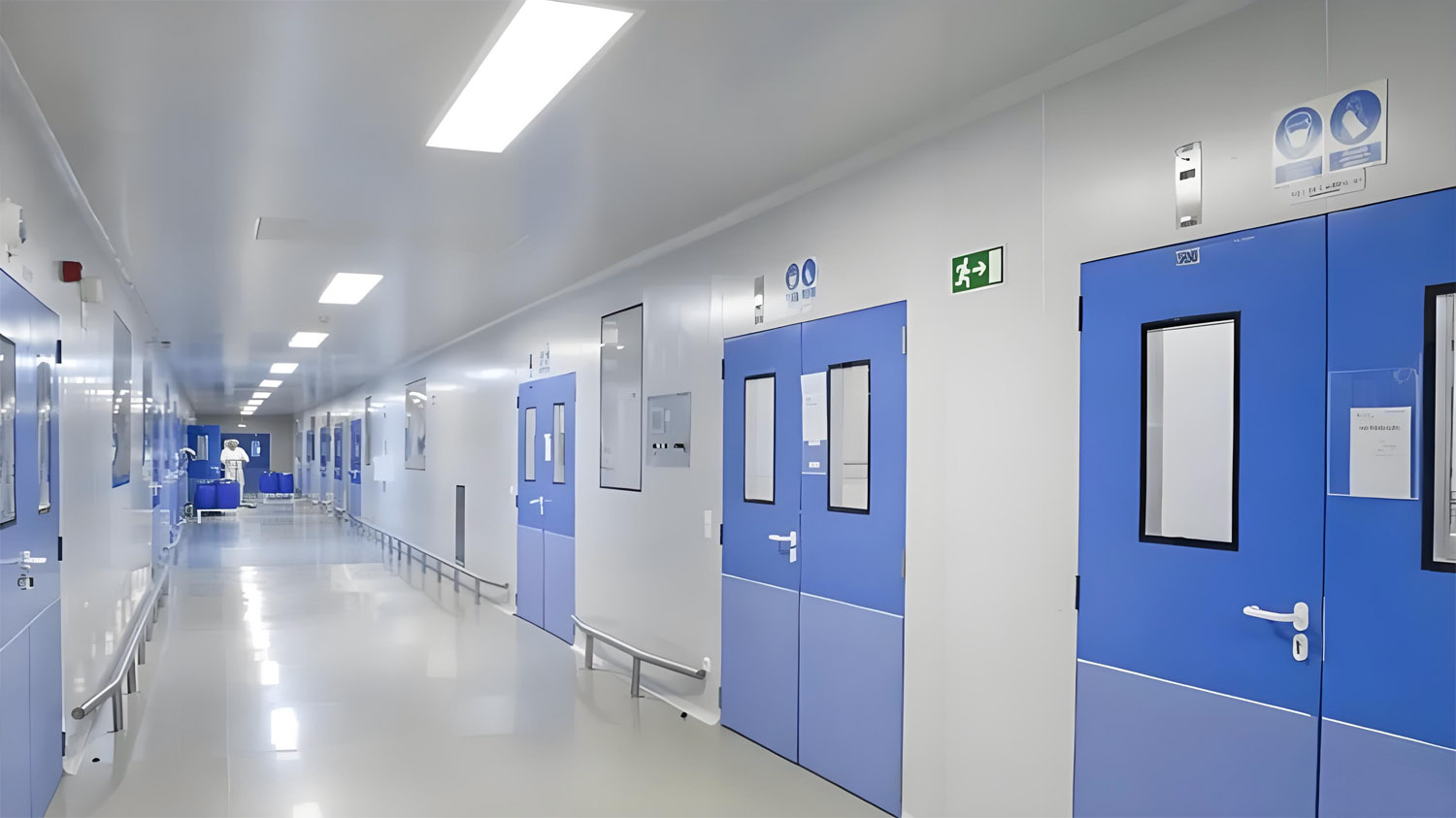 High-tech pharmaceutical or chip manufacturing cleanroom interior showcasing smooth, seamless wall panels.jpg
