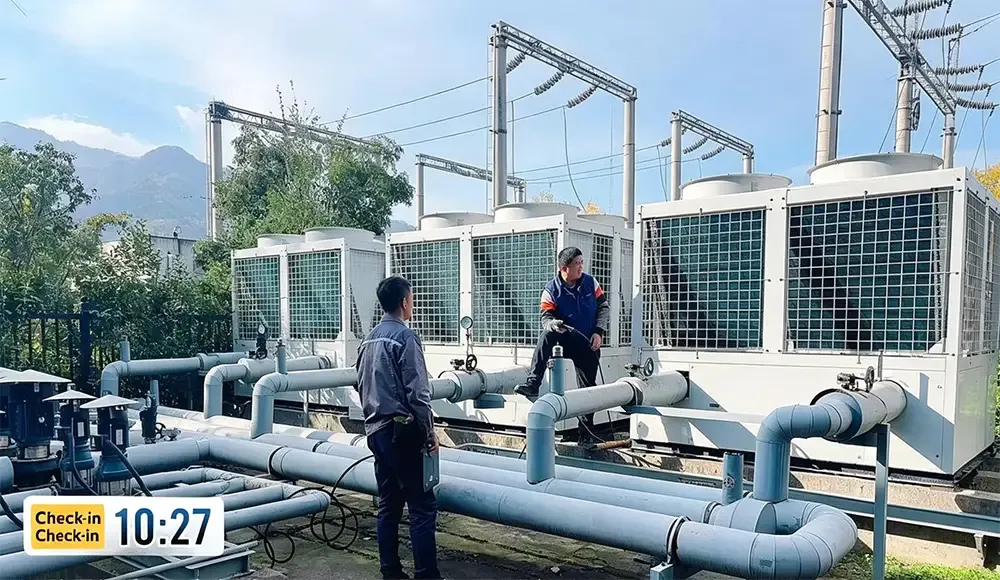 Daily inspection of chiller pressure gauges and control panel.webp
