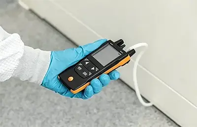 The Cleanroom Pressure Trio: Compare Gau