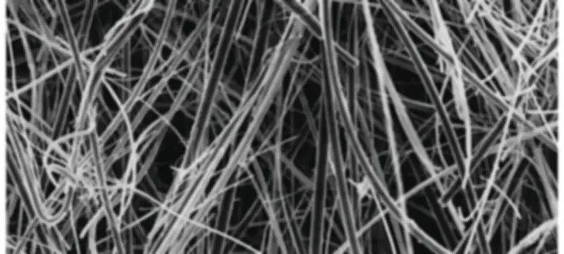 Macro view of glass fiber HEPA media with airflow passing through