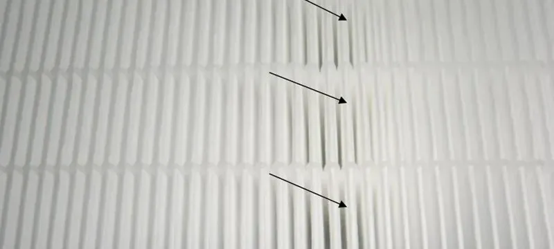 Close-up of dry HEPA filter pleated glass-fiber media with hot-melt separators