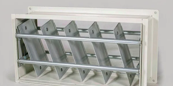 Multi-blade airfoil volume control damper in rectangular duct