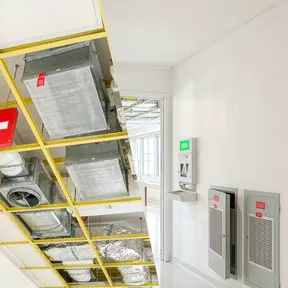 Deiiang fire and smoke dampers in a modern hospital ceiling installation