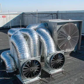 Deiiang backdraft dampers on laboratory fume hood exhaust stacks
