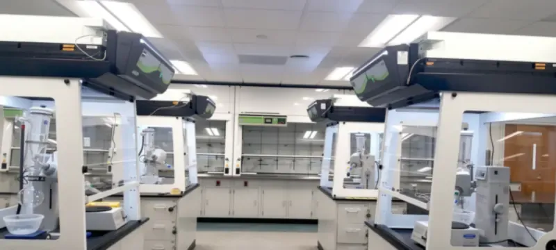 University teaching laboratory with multiple fume hoods University teaching laboratory with multiple fume hoods